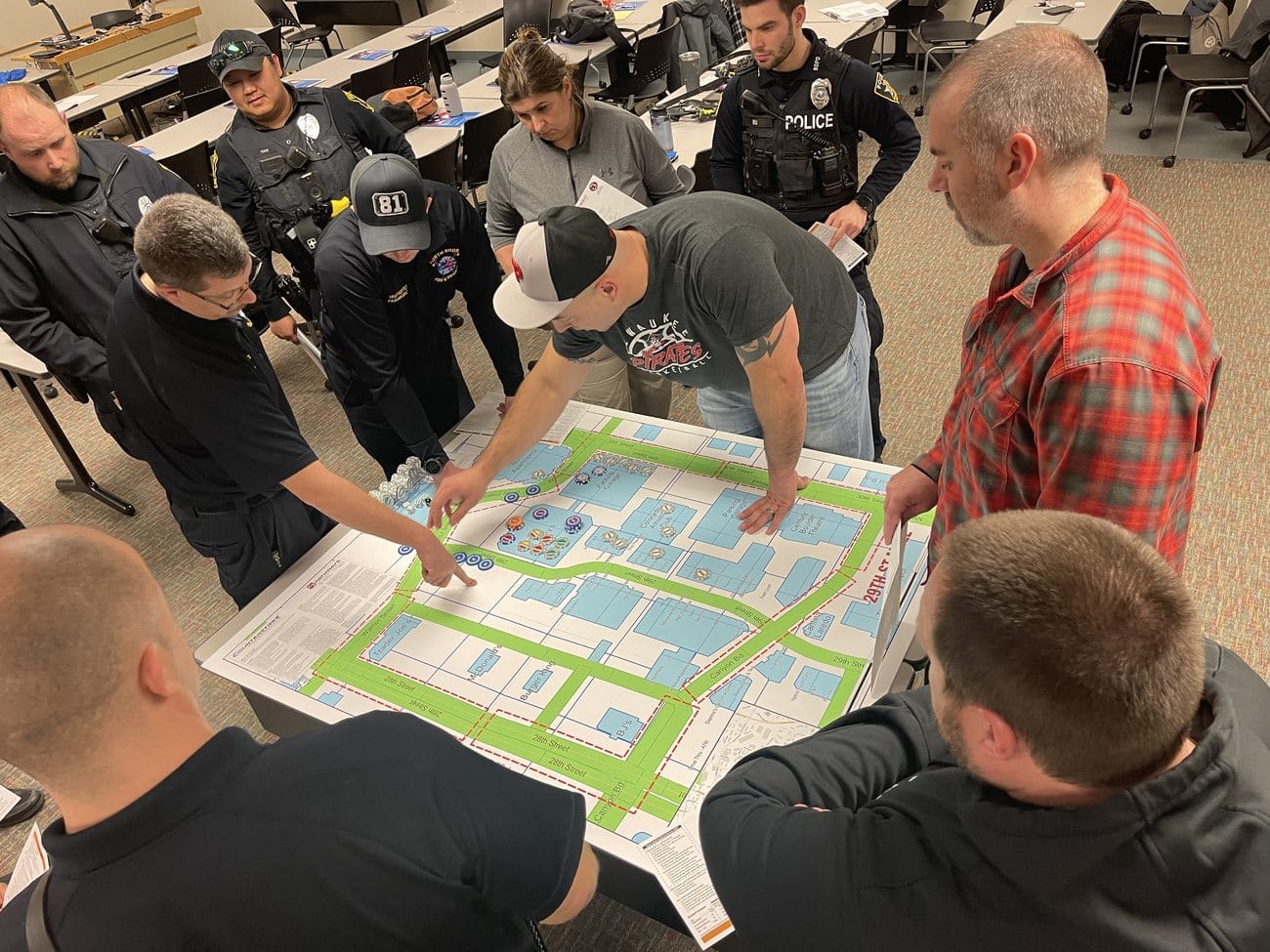 A multi-discipline team runs an integrated response on the map